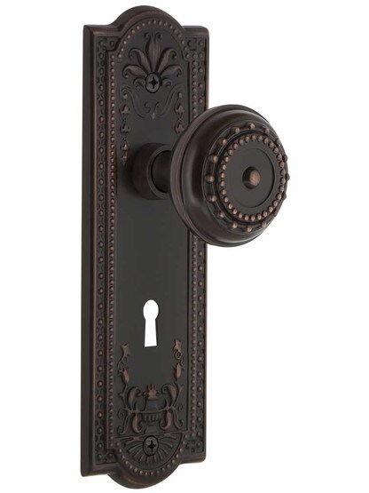 Meadows Door Set with Matching Knobs and Keyhole in Timeless Bronze.